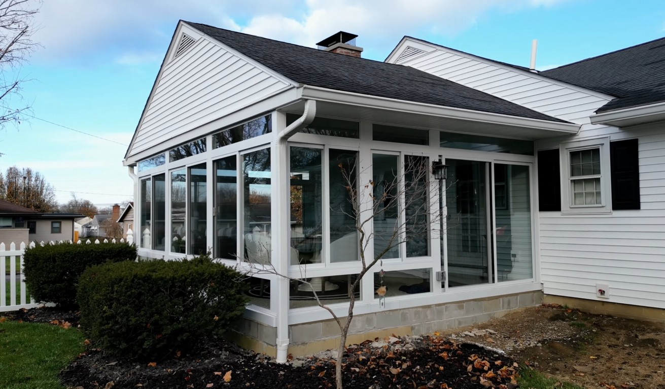 Three-season sunroom with large glass windows in Ventura, CA